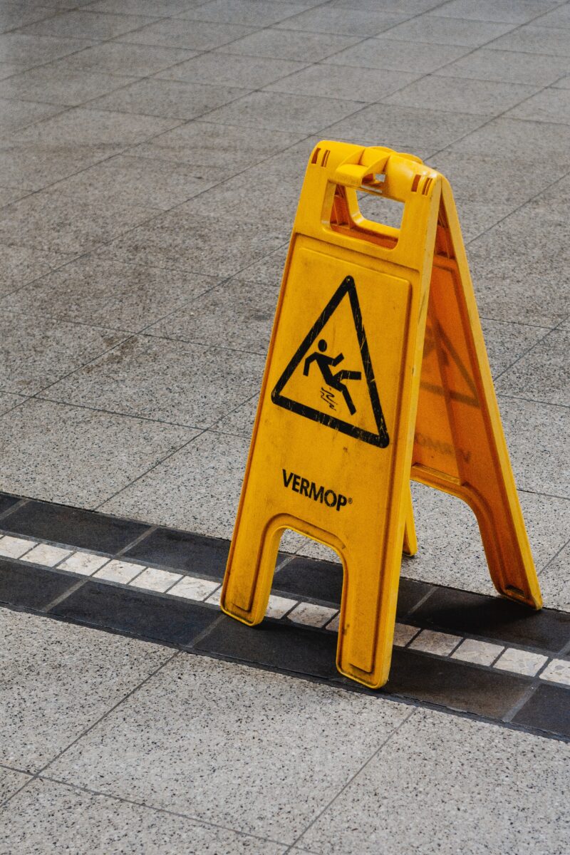 How to handle a store slip and fall with caution sign slip and fall wet ground
