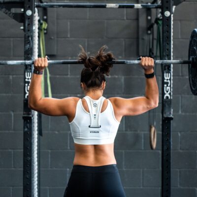 Going fit in mind, body, & connections with woman lifting weights