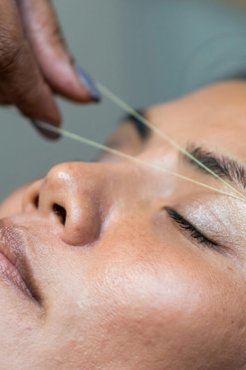 Online beauty fails: why following trends can be a disaster with woman getting eyebrow threading