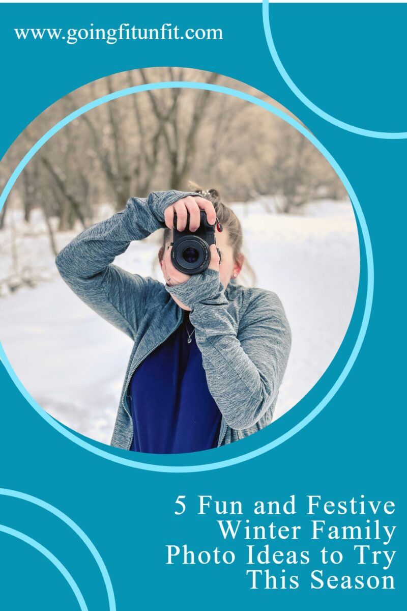 Woman taking a picture in the snow